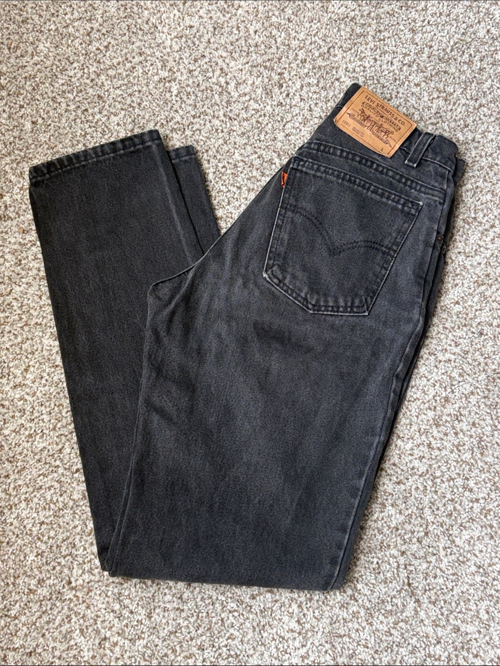 Levi’s vintage 950 orange tab relaxed fit tapered leg high rise jeans